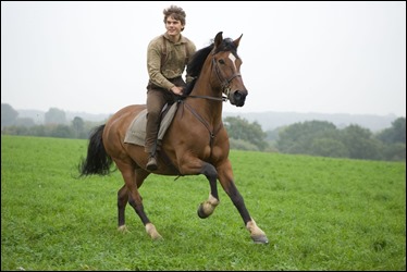 "WAR HORSE"..DM-AC-25226..Albert Narracott (Jeremy Irvine) joyfully rides atop his beloved horse, Joey in DreamWorks Pictures' "War Horse", director Steven Spielberg's epic adventure and an unforgettable odyssey through courage, friendship, discovery and wonder...Ph: Andrew Cooper, SMPSP..©DreamWorks II Distribution Co., LLC. ÊAll Rights Reserved.