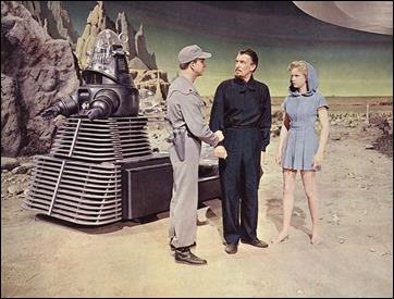 Leslie Nielsen, Walter Pidgeon y Anne Francis en la superficie del Planeta Prohibido