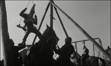 Los caballeros de pesadas armaduras izados a sus caballos