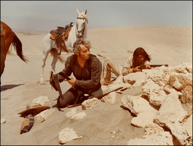 Volonte y Milian cara a cara y hombro con hombro